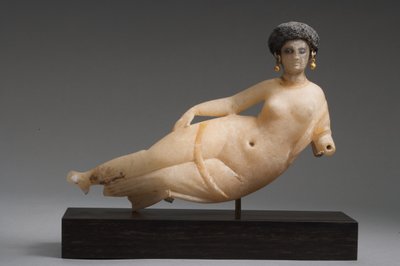 Figure of a Reclining Woman by Syrian